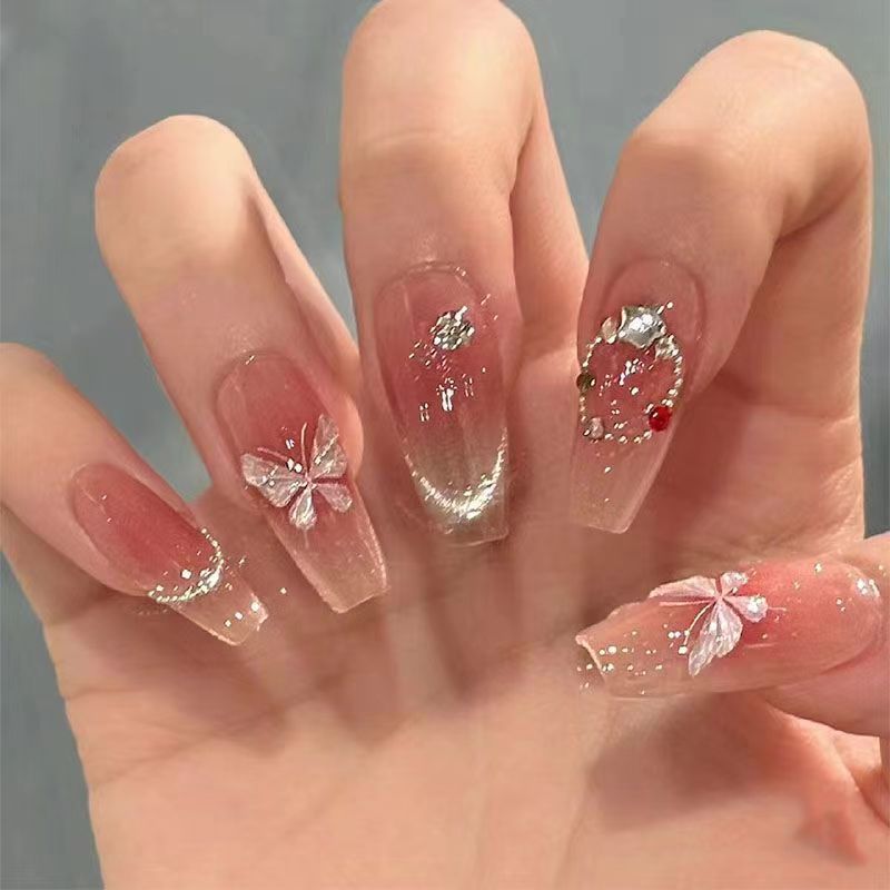 10-piece set of handmade nail decals, featuring cat eyes and pink butterflies, Ins-style