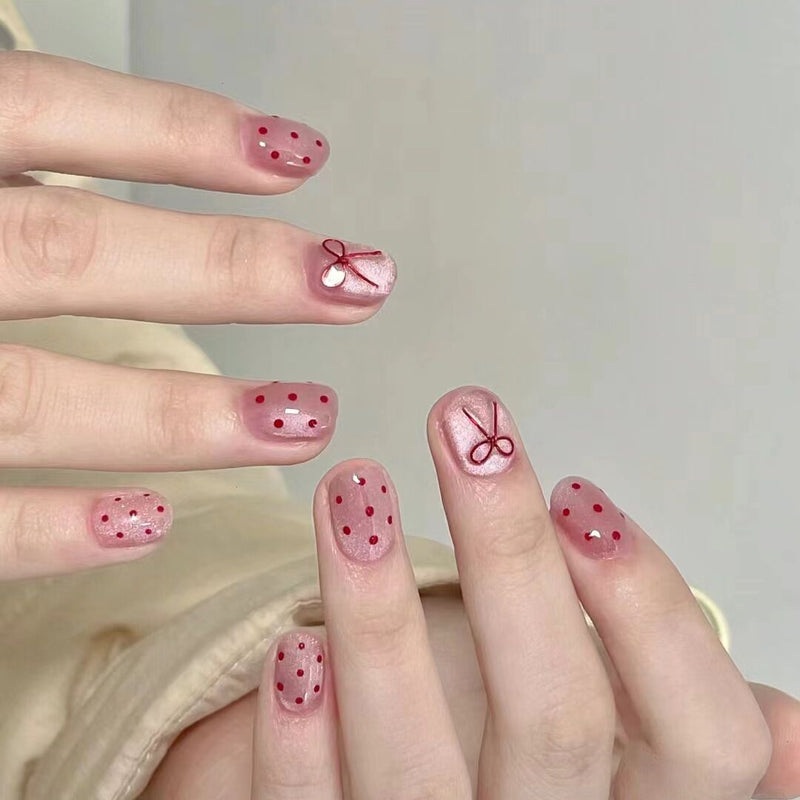 10-piece set of handmade nail decals, featuring cat eyes and pink butterflies, Ins-style